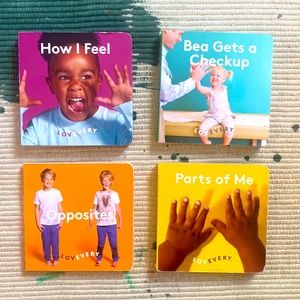 Four Lovevery books—How I Feel, Bea Gets a Checkup, Opposites, Parts of Me